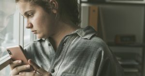 How To Protect Your Teen's Self Esteem From Social Media Threats