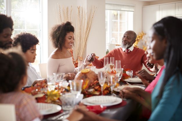 Happy Black family at Thanksgiving