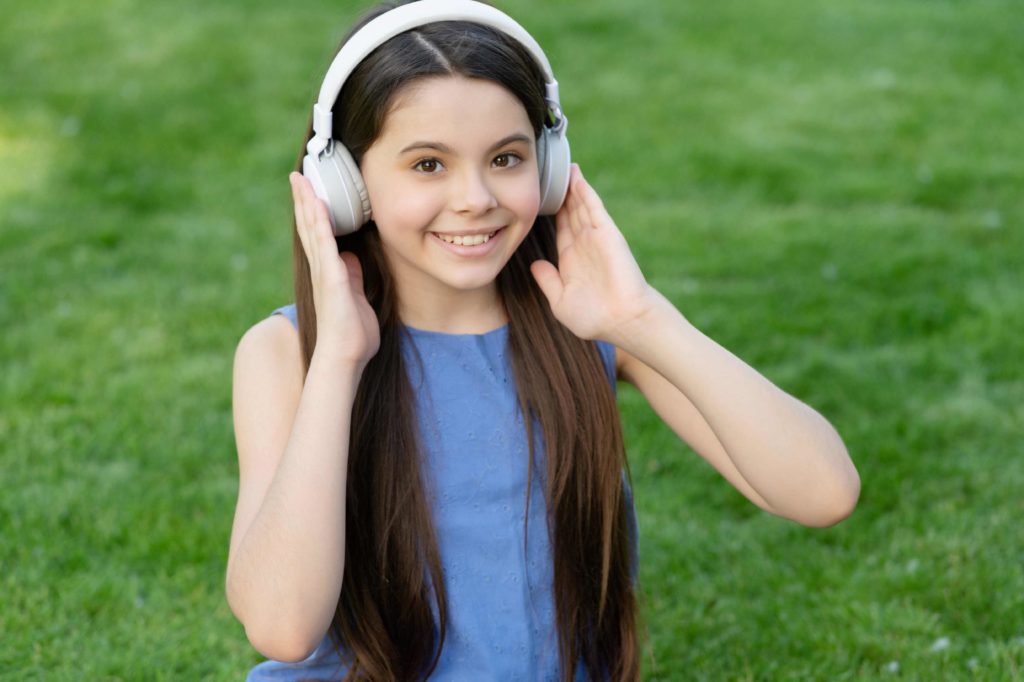 teen listening to audiobook